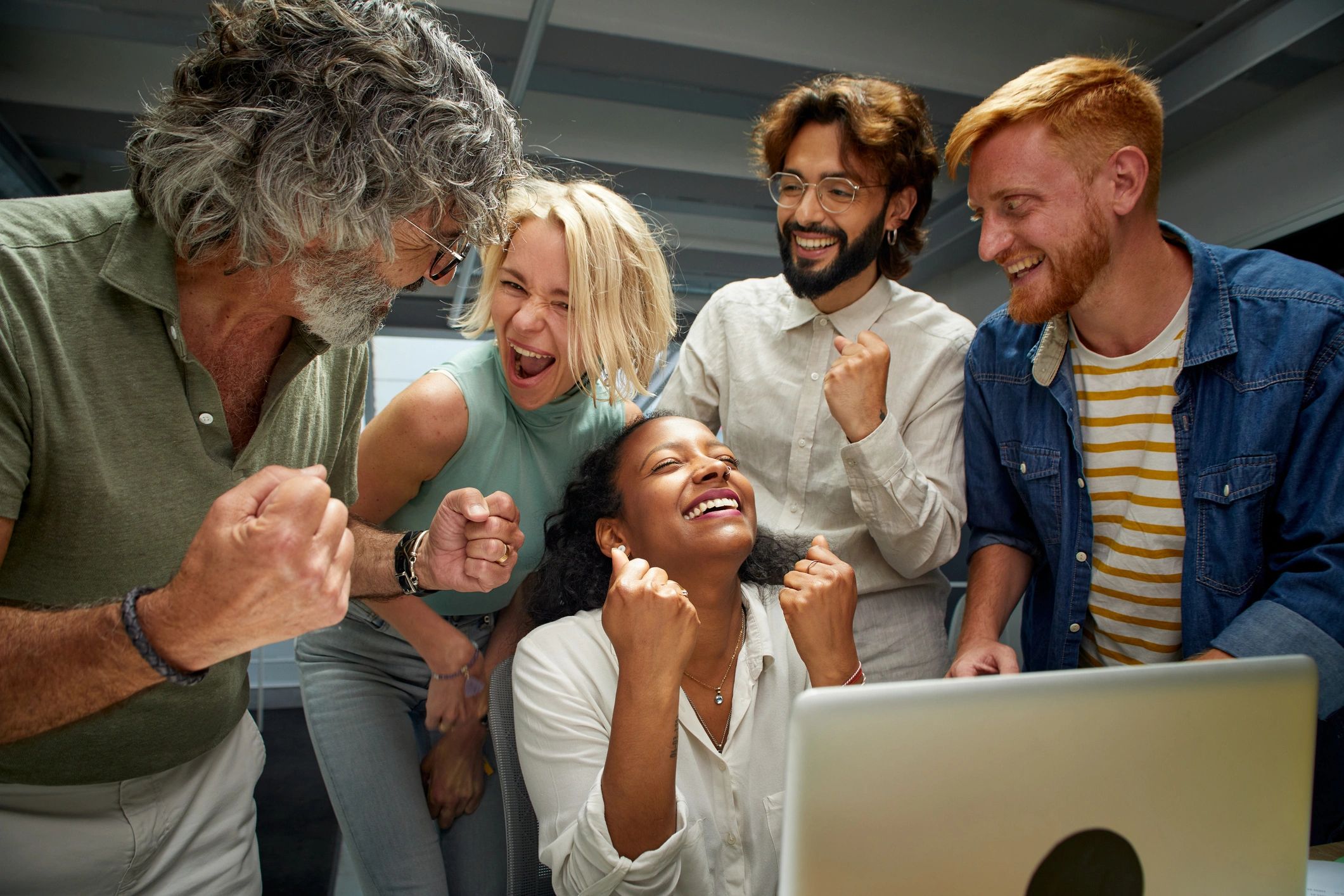 diverse professionals celebrating success tech training